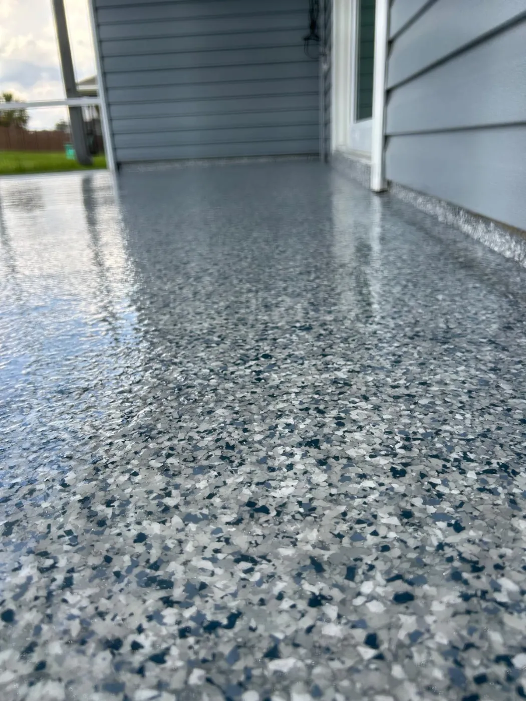 Screened Patio Epoxy Flake Flooring by Elite Epoxy Surfaces, Central Florida