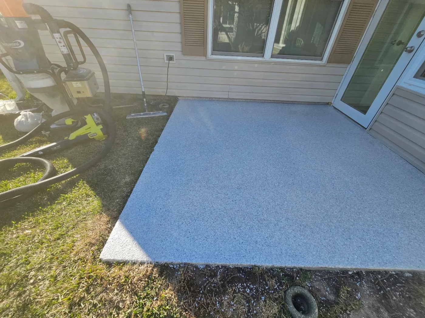 Blue-Gray Epoxy Flake Patio Coating by Elite Epoxy Surfaces, Central Florida