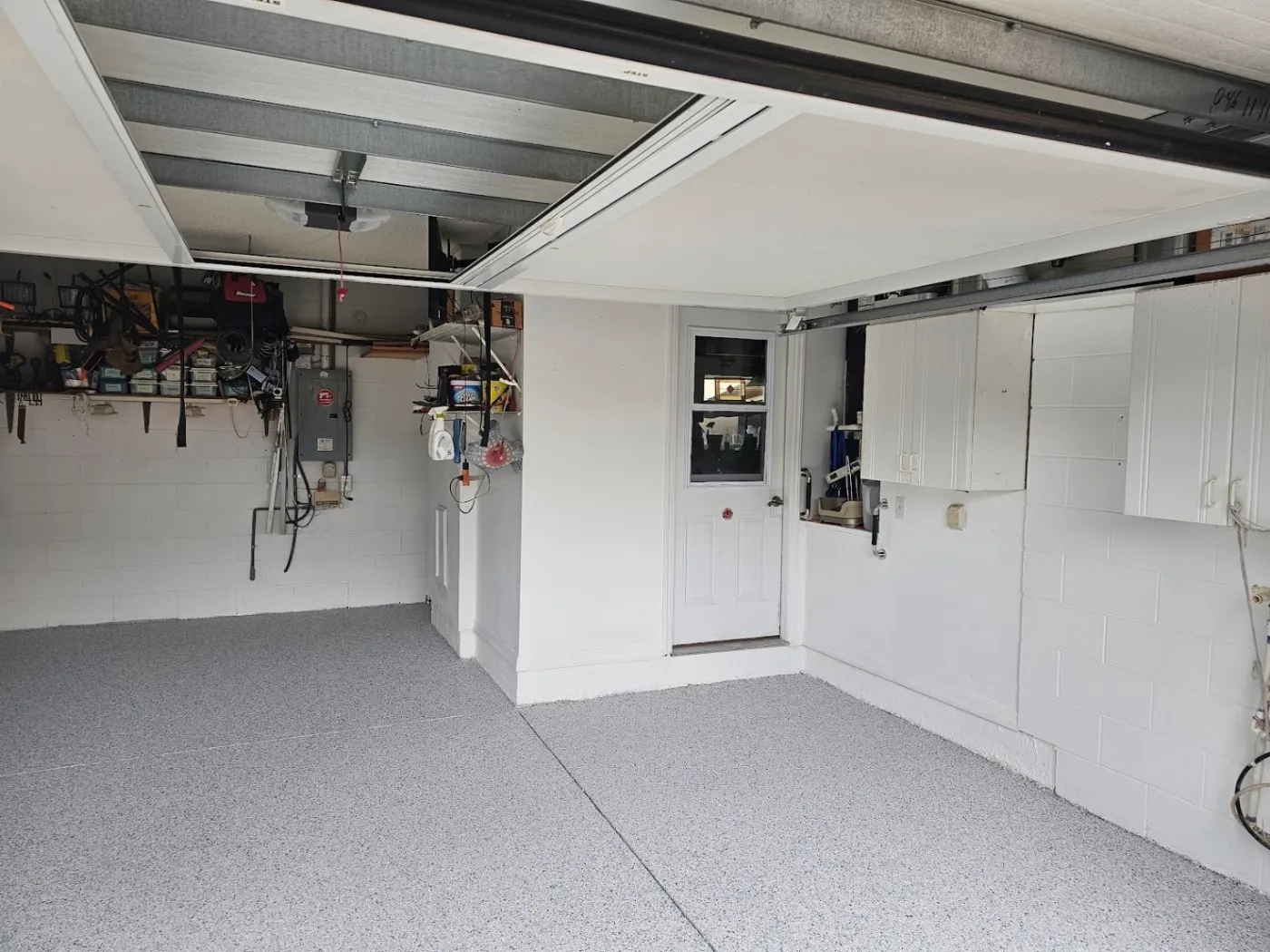 Full-Broadcast Epoxy Flake Garage Floor by Elite Epoxy Surfaces, Central Florida
