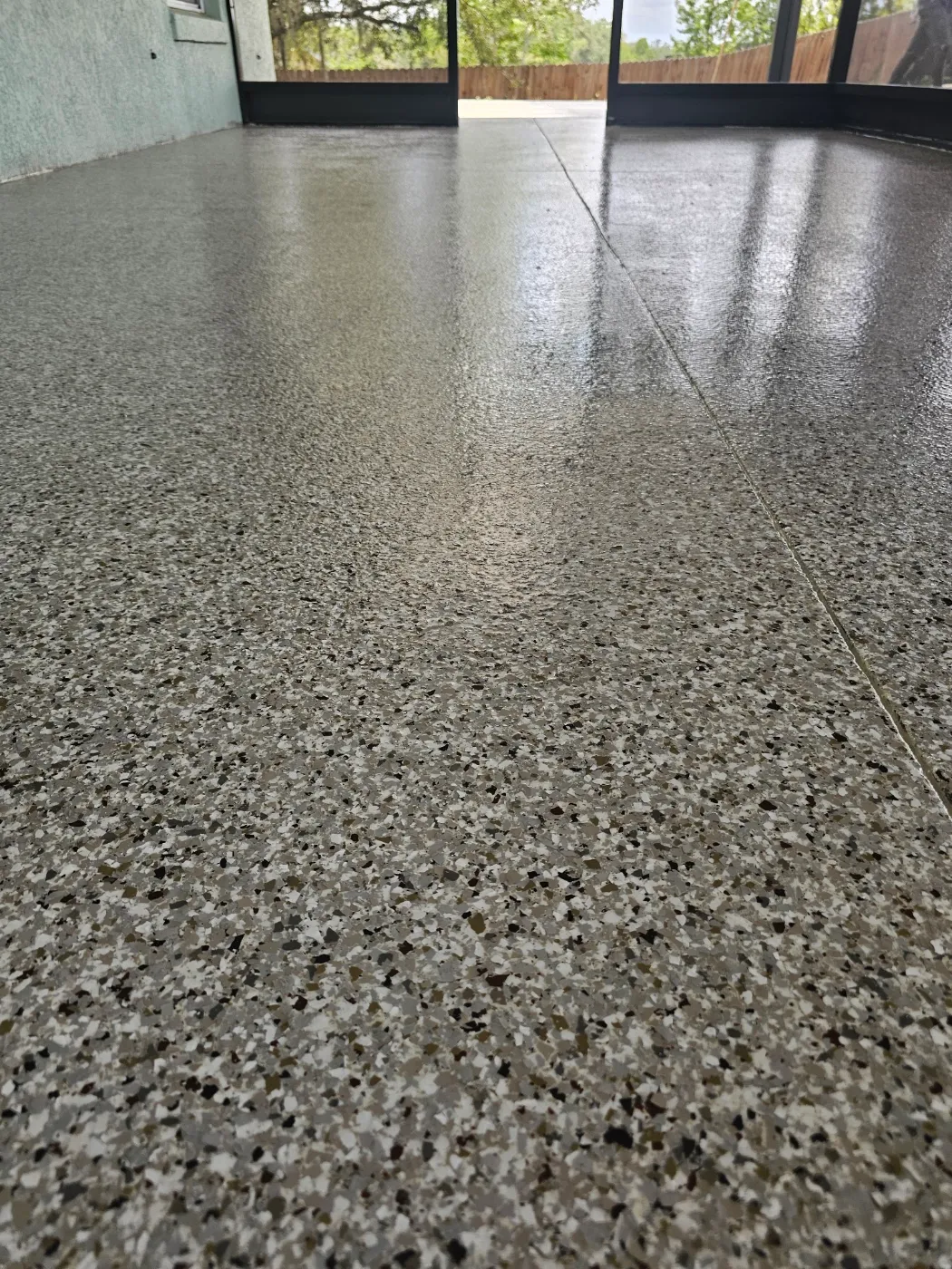 Screened Lanai Epoxy Flake Coating by Elite Epoxy Surfaces, Central Florida