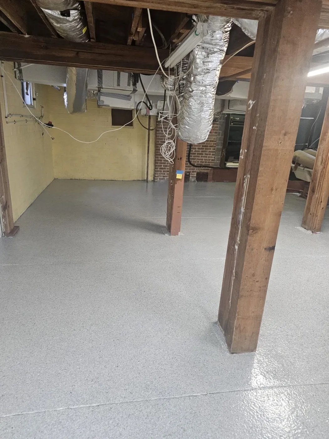 Light Gray Flake Basement Floor Coating by Elite Epoxy Surfaces, Central Florida