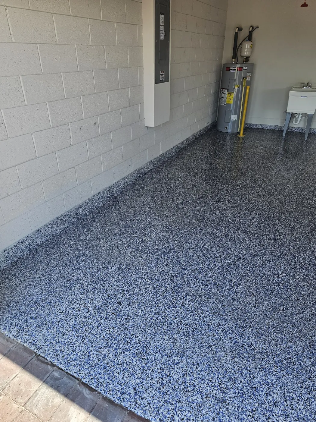 Garage Floor Coating with Utility Sink by Elite Epoxy Surfaces, Central Florida