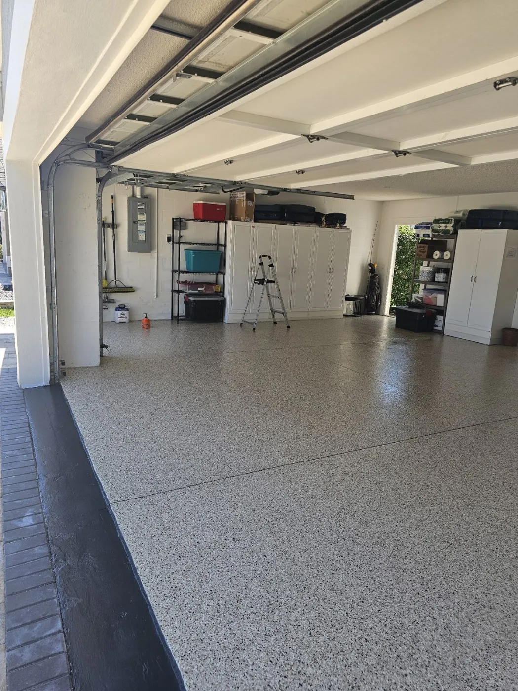 Charcoal-Trim Garage Floor Coating by Elite Epoxy Surfaces, Central Florida