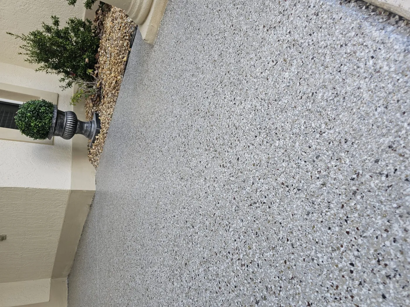 Earth-Tone Flake Porch Coating by Elite Epoxy Surfaces, Central Florida
