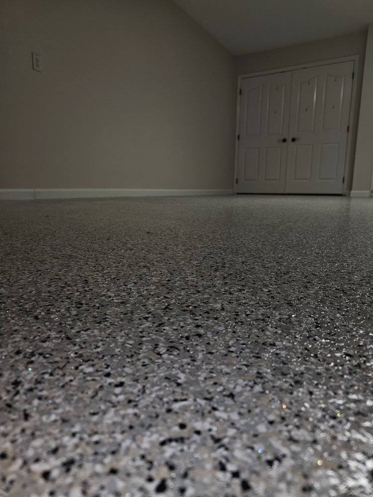 Garage Floor Coating Near Entry Door by Elite Epoxy Surfaces, Central Florida