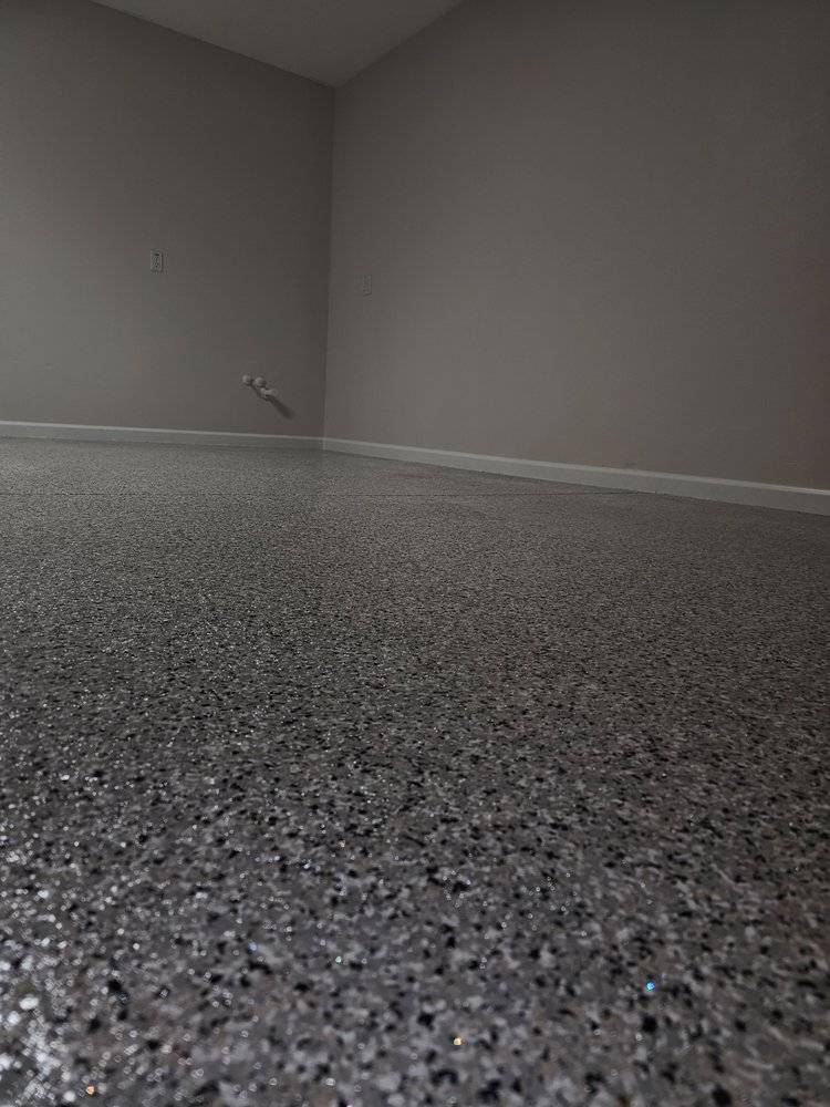 Empty Garage Floor Coating by Elite Epoxy Surfaces, Central Florida