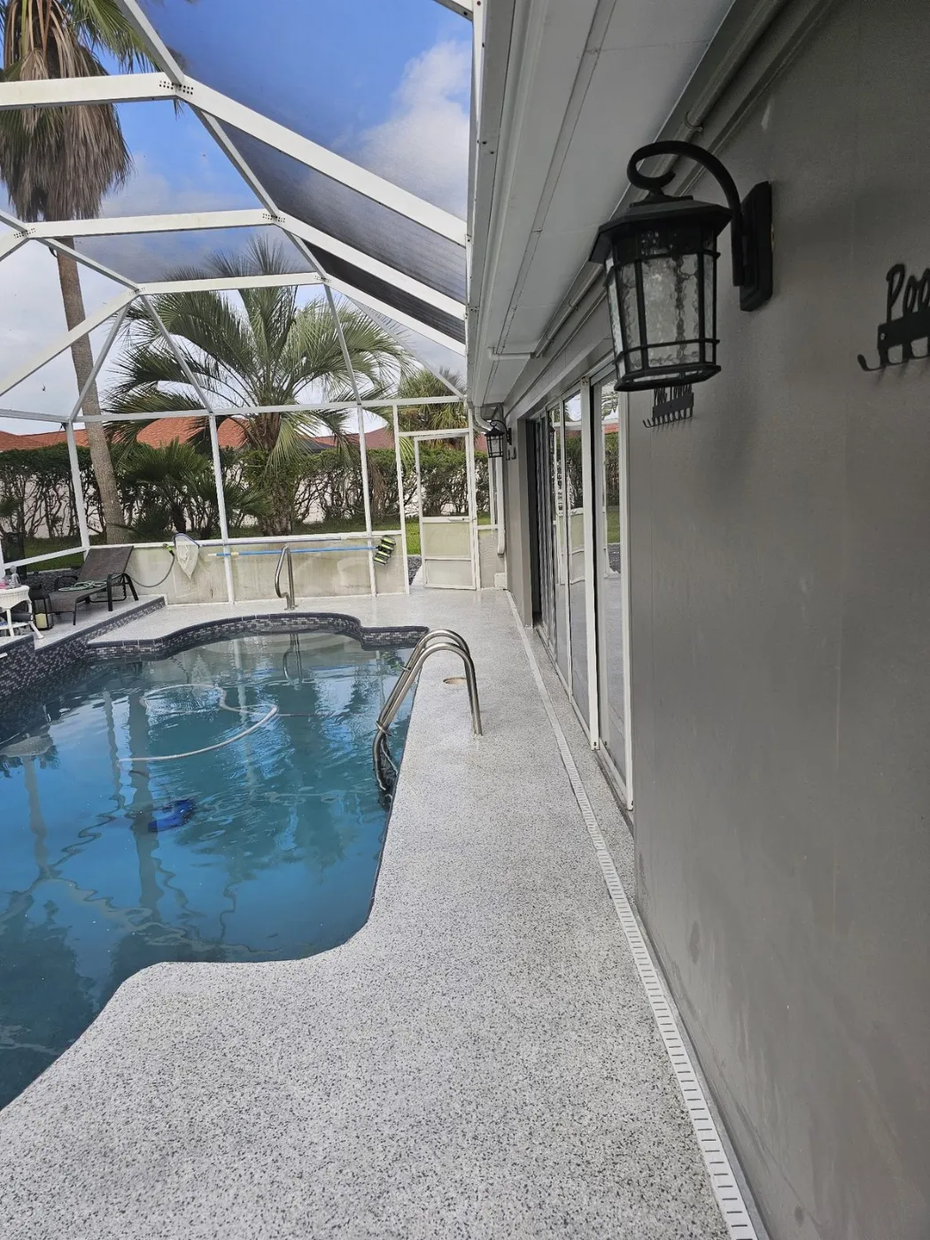 Screened Pool Deck Walkway Coating by Elite Epoxy Surfaces, Central Florida